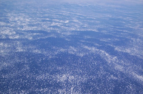 2:24 pm: The view from the airplane window, around latitude 64 degrees south.