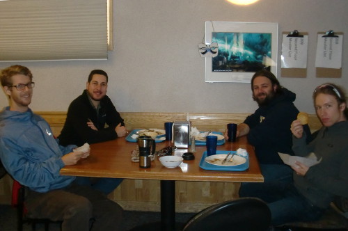 Enjoying dinner.  Left to right: Jamie, Me, James and Hans.