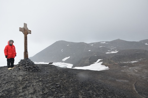 Me standing next to the George T. Vince memorial cross.  Credit: Hans Niederhausen.