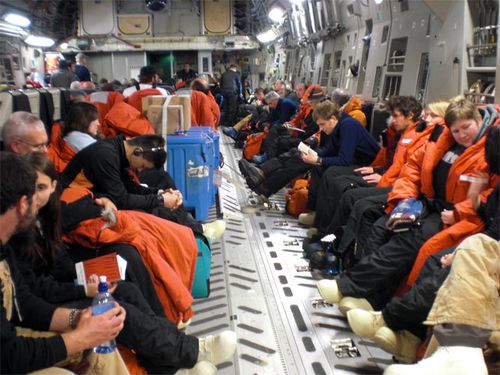 Everyone is aboard the plane to  Antarctica.