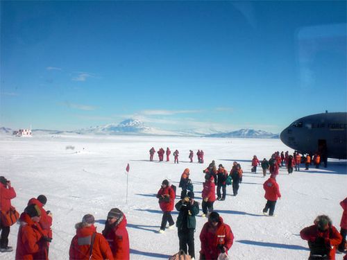 Everyone leaving the plane and  stepping foot onto Antarctica.