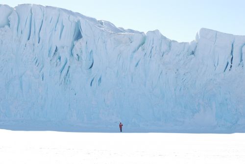 Francois is standing in front of the  Barne Glacier.