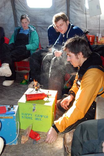 Nick demonstrates the correct way to  light a camp stove.