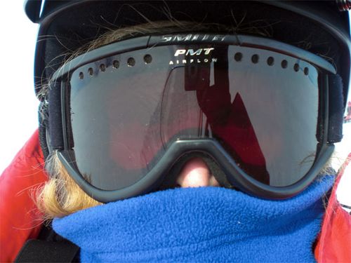 A self-portrait taken on the  snowmobile.