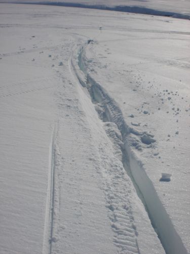 The track made by my snowmobile when it hit a crack.