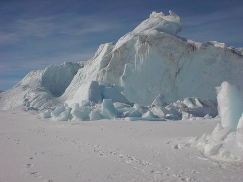 The iceberg is covered with icicles.