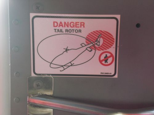 Do not walk into the tail rotor!