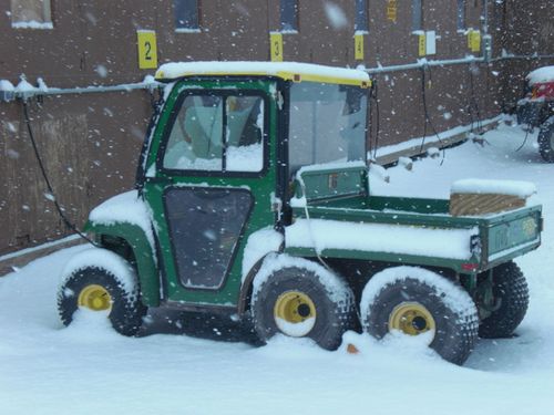  A small truck in the snow.