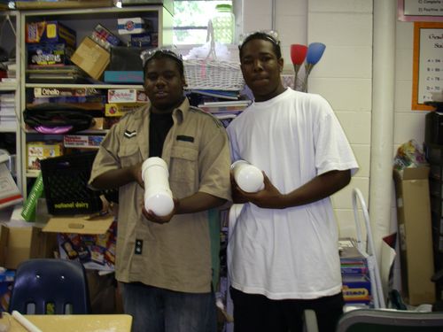 Vernon and Rashad display the completed floatation devices.