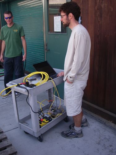 Scott mans a computer during a test  of SCINI.