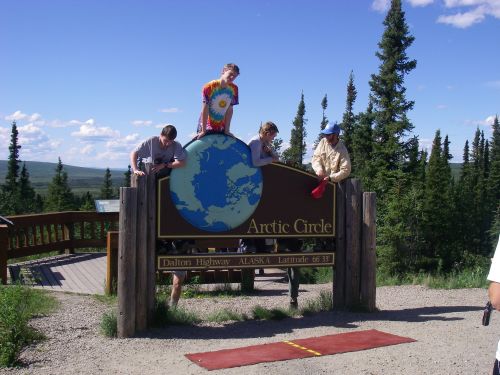 Hikers reach Arctic Circle and Pose.