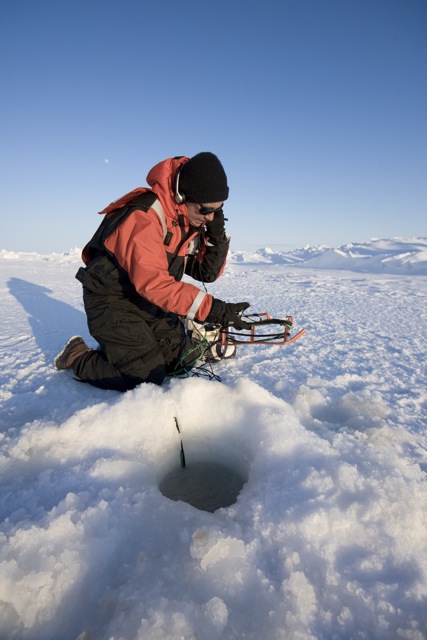 Dr. Sue Moore using a hydrophone to listen for marine mammals