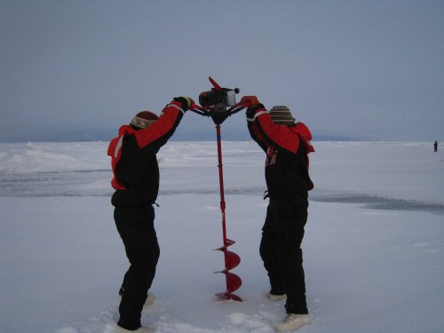 Collecting water samples on ice