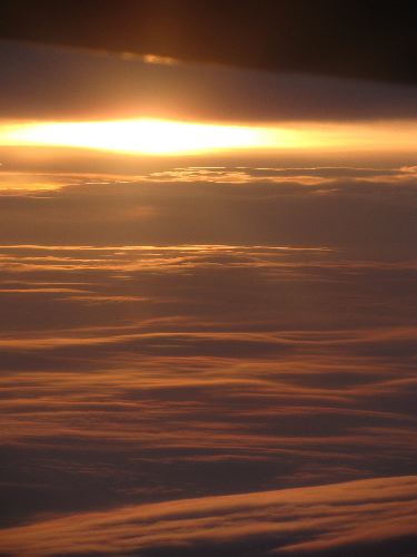 Sunset above the clouds