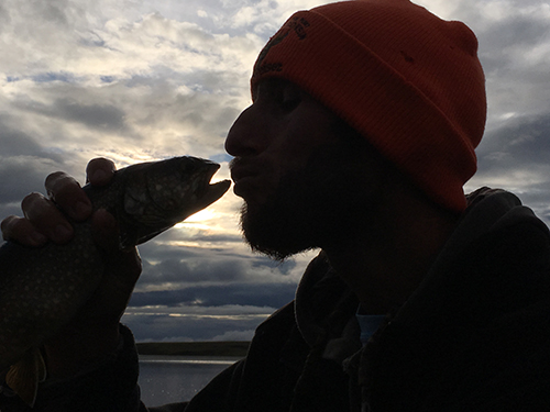 Greg Hill kisses fish