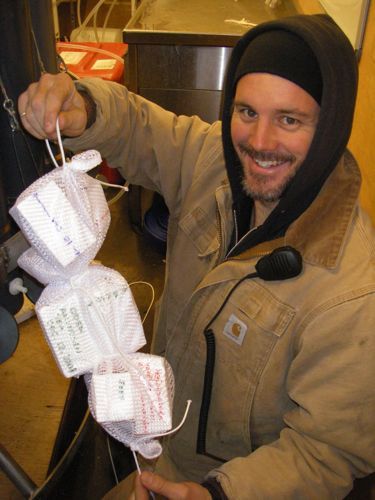 Jeremy ties the foam blocks in the bag