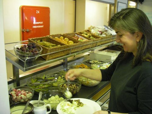 Dr. Tish Yager makes herself a salad for lunch