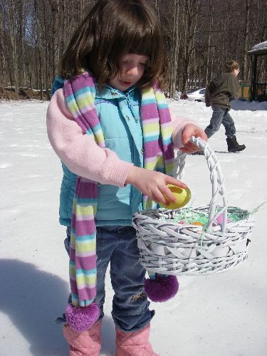 Ally puts the egg in her basket