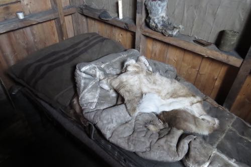 A bed with furs