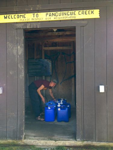 Hauling water from the community well