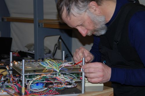 George repairing the Kominko-Slade AWS at WAIS field camp.