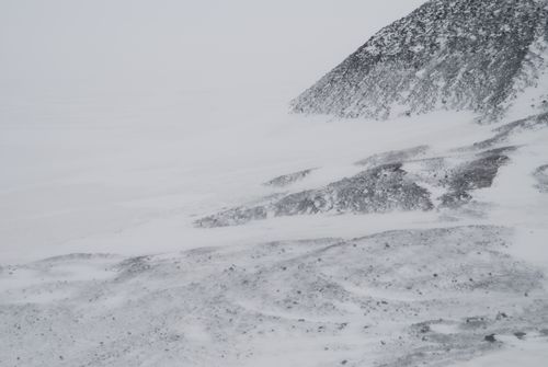 Black rock and White snow at Hut Point