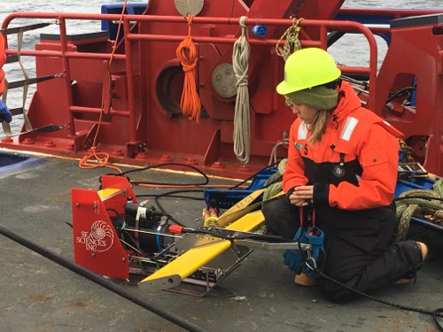 Dr. Kristina Kvile on the deck of the R/V Sikuliaq!