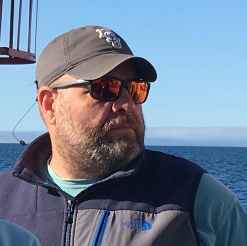 Dr. Mike Lowe on the deck of the R/V Sikuliaq! August 2017.  Photo by Lisa Seff.