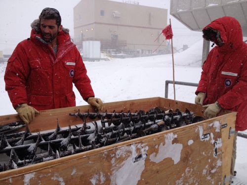 Preparing our crate of pipes and drill bits.