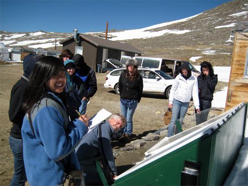 Our group of Drake High students getting ready to repair our cold frame after a hard winter