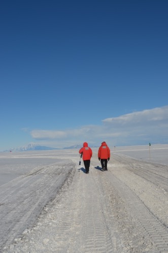 Terry Palmer and Carl Green walking to dive hut