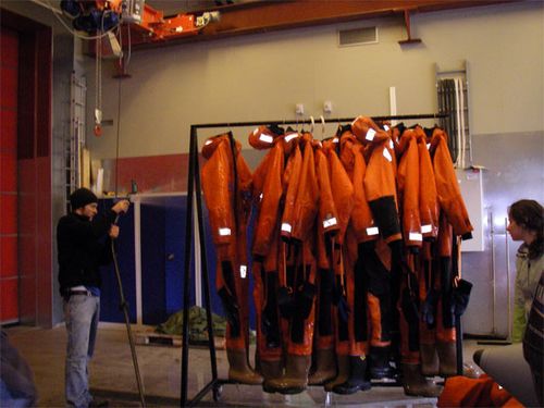 Spraying down the dry suits