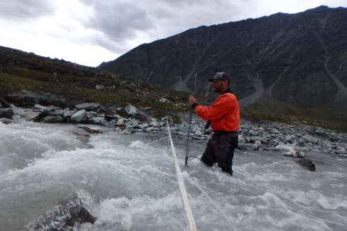 Chris measuring discharge