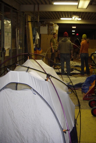 Putting up the tents.