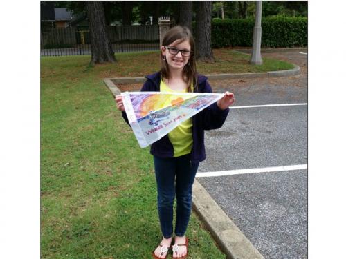 Angelyna Nevi with her flag