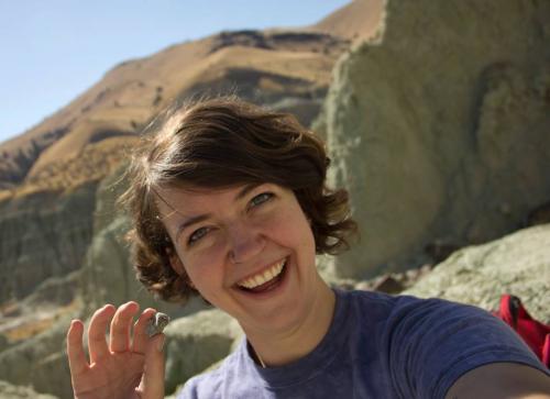 Allyson with a fossil