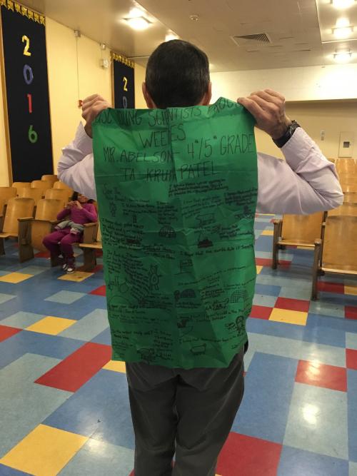 Mr. Abelson holding his Arctic flag.