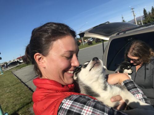 Christina and Jenny with puppies