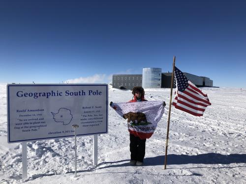 Flag at Geographic Sign