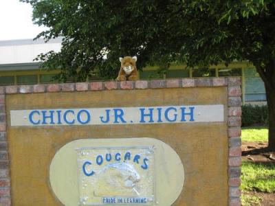 CJ resting on the Chico Junior High School Sign