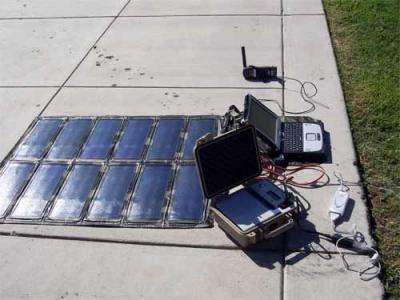 Close-up of solar panel and computer-sat phone hook-up