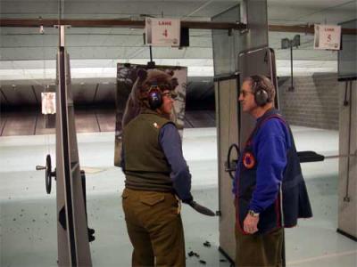 Cathy Geiger and Joe Nava at the shooting range.