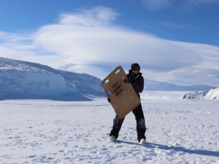 Bridget Ward showing off the herding board she used while working with the Weddell seal moms 