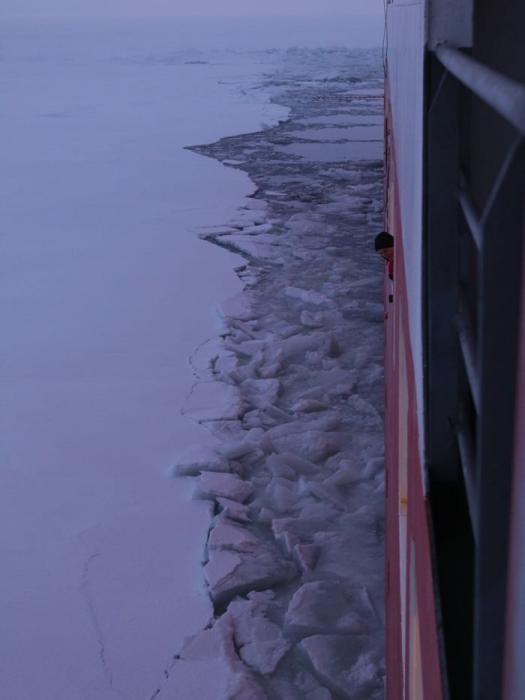 Ship breaking through 1-meter ice