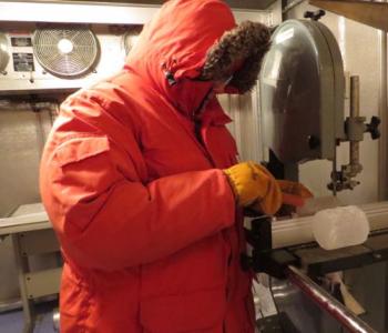 Bault cutting thin sections in the cold room.