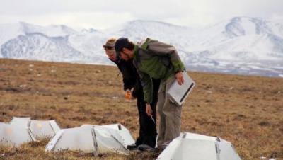 Melissa Lau and Matthew Simon Taking measurements at Imnavait Creek