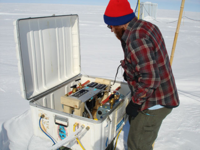 Luke making adjustments to the flow meter/pump