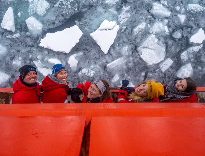 5 educators on the stern of an icebreaker