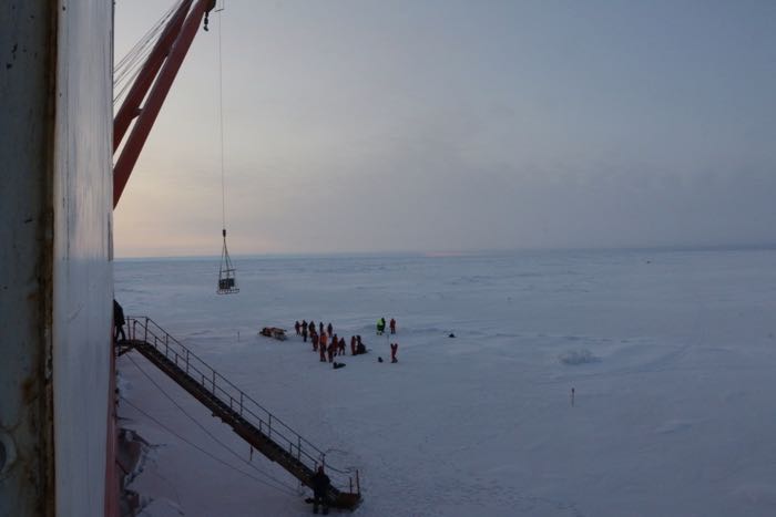 Unloading gear onto the ice