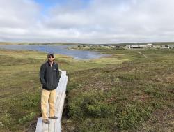 Researcher Jeremy May on the boardwalk at Toolik Field Station, Alaska.